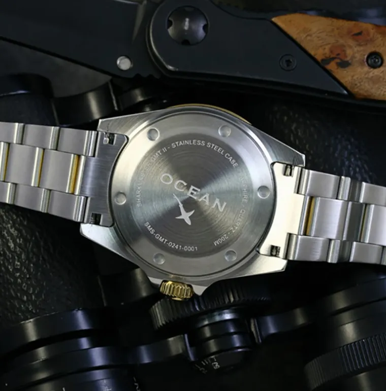 sharkmaster_gmt_gold_2.webp SHARKMASTER GMT GOLD